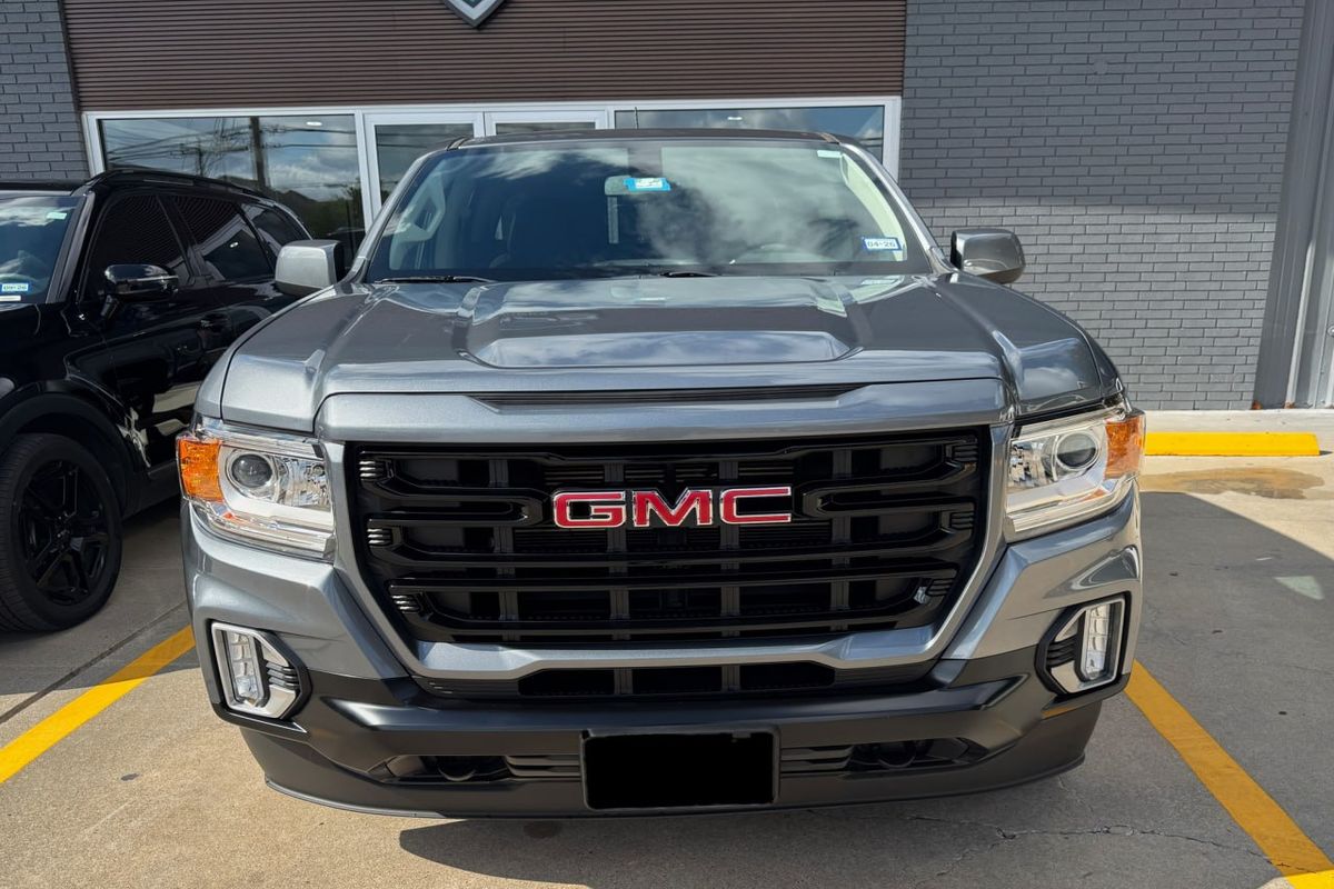 After collision repair front view restored truck with refinished panels