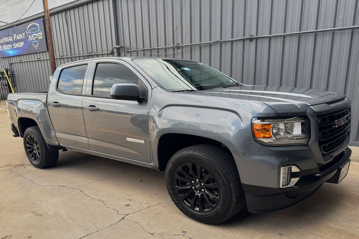 After collision repair front-quarter view restored truck in Houston